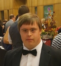 Adrian Forsythe in a tuxedo at a gala